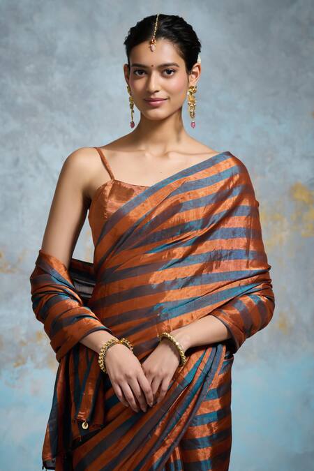 Shop_Dressfolk_Peach Tissue Zari Pratibha Striped Pre-draped Saree With Unstitched Blouse Piece_Online_at_Aza_Fashions
