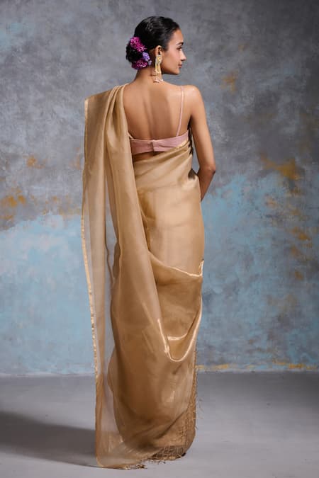 Shop Dressfolk Gold Organza Zari Arista Pre-draped Saree With Unstitched Blouse Piece at Aza Fashions Shop_Dressfolk_Gold Organza Zari Arista Pre-draped Saree With Unstitched Blouse Piece_at_Aza_Fashions