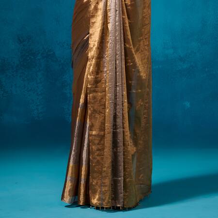 Dressfolk Gold Tissue Isha Pre-draped Saree With Unstitched Blouse Piece Online at Aza Fashions Dressfolk_Gold Tissue Isha Pre-draped Saree With Unstitched Blouse Piece_Online_at_Aza_Fashions