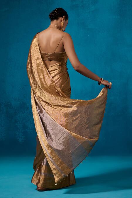 Shop Dressfolk Gold Tissue Isha Pre-draped Saree With Unstitched Blouse Piece at Aza Fashions Shop_Dressfolk_Gold Tissue Isha Pre-draped Saree With Unstitched Blouse Piece_at_Aza_Fashions