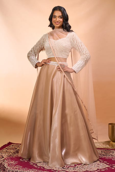 Alaya Advani Beige Satin, Organza, Net Beads, Embroidery Leaf Neck Hand Blouse Lehenga Set at Aza Fashions Alaya Advani_Beige Satin, Organza, Net Beads, Embroidery Leaf Neck Hand Blouse Lehenga Set _at_Aza_Fashions