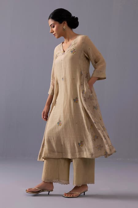 Label Shreya Sharma_Beige Chanderi Embroidery V-neck Sagarika Thread Placement Kurta Set _at_Aza_Fashions