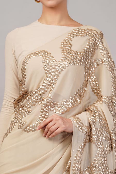 Shop_Abraham And Thakore_Beige Viscose Georgette Sequins French Cut Rings Embellished Saree _Online_at_Aza_Fashions