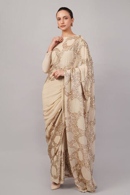 Abraham And Thakore_Beige Viscose Georgette Sequins French Cut Rings Embellished Saree _at_Aza_Fashions