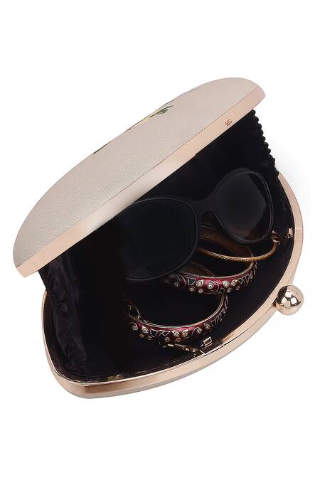 Nazaakat By Samara Singh Cream Floral Printed Oval Clutch With Detachable Sling Online at Aza Fashions Nazaakat By Samara Singh_Cream Floral Printed Oval Clutch With Detachable Sling_Online_at_Aza_Fashions