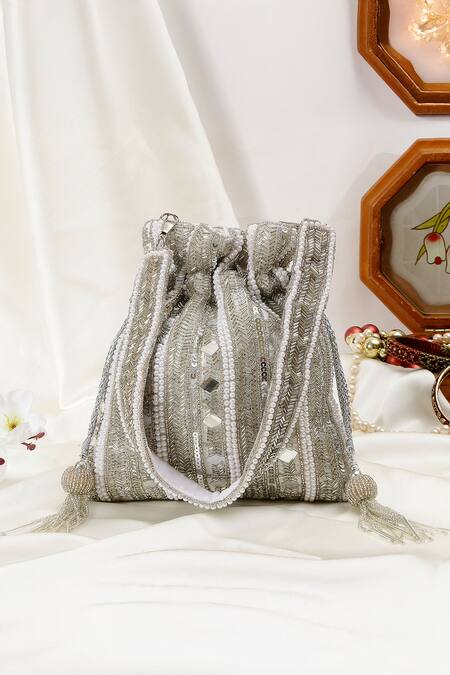 Nazaakat By Samara Singh White Beads, Sequins, Mirrors, Tassels Beaded And Embellished Potli Bag at Aza Fashions Nazaakat By Samara Singh_White Beads, Sequins, Mirrors, Tassels Beaded And Embellished Potli Bag_at_Aza_Fashions
