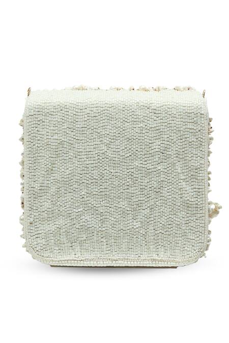 Shop The Tan Clan White Beads, Pearls, Tassels Jena Embellished Flapover Bag Online at Aza Fashions Shop_The Tan Clan_White Beads, Pearls, Tassels Jena Embellished Flapover Bag _Online_at_Aza_Fashions