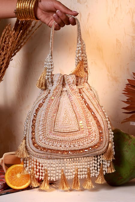 The Tan Clan Nora Beige Tasselled Potli Bag 