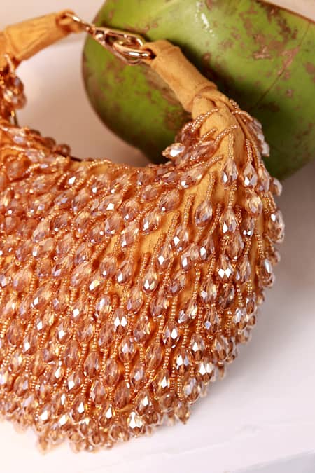 Shop_The Tan Clan_Gold Beads, Crystals Jia Half Moon Bag _Online_at_Aza_Fashions
