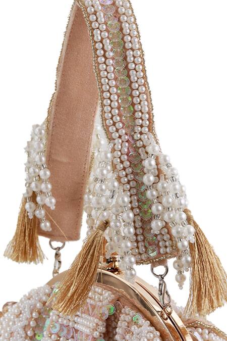 The Tan Clan Beige Beads, Sequins, Pearls, Tassels Nora Half Moon Bag at Aza Fashions The Tan Clan_Beige Beads, Sequins, Pearls, Tassels Nora Half Moon Bag _at_Aza_Fashions