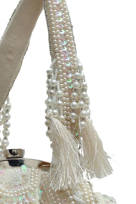 The Tan Clan White Beads, Pearls, Sequins, Tassels, Crystals Nora Half Moon Bag at Aza Fashions The Tan Clan_White Beads, Pearls, Sequins, Tassels, Crystals Nora Half Moon Bag _at_Aza_Fashions