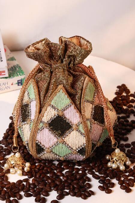 Shop_The Tan Clan_Gold Sequins, Beads, Pearls, Stones Ketki Lotus Potli With Handle _Online_at_Aza_Fashions