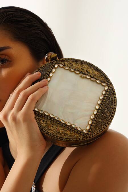 Shop The Tan Clan Gold Crystals, Stones, Chains Seren Brass Clutch Online at Aza Fashions Shop_The Tan Clan_Gold Crystals, Stones, Chains Seren Brass Clutch _Online_at_Aza_Fashions