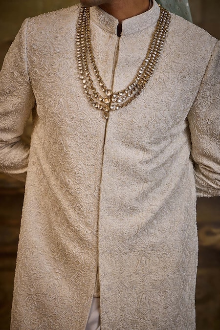 Shop_Nitika Gujral_Ivory Silk, Cotton Embroidery Raw Sherwani With Churidar _Online_at_Aza_Fashions