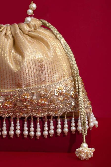 Shop_Amyra_Beige Pearls, Tassels, Lace, Beads, Crystals Vivaah Embellished Potli - _Online_at_Aza_Fashions