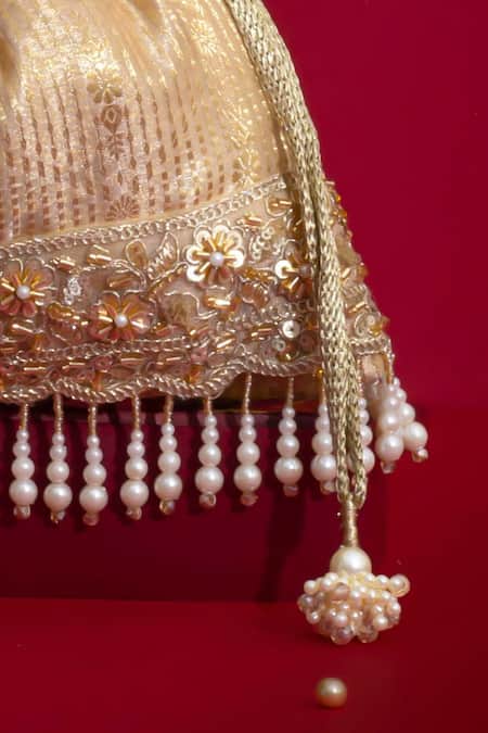 Amyra_Beige Pearls, Tassels, Lace, Beads, Crystals Vivaah Embellished Potli - _at_Aza_Fashions