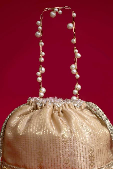 Shop_Amyra_Beige Embroidery, Pearls, Tassels, Beads, Lace Vivaah Embellished Bucket Bag - _Online_at_Aza_Fashions