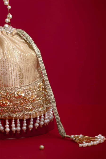 Amyra_Beige Embroidery, Pearls, Tassels, Beads, Lace Vivaah Embellished Bucket Bag - _at_Aza_Fashions