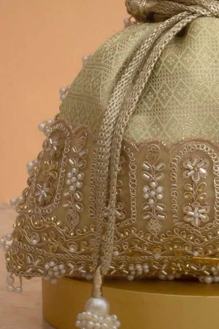 Buy Amyra Mint Cut Work, Pearls, Tassels, Beads Geet Brocade Embellished Potli - Online at Aza Fashions Buy_Amyra_Mint Cut Work, Pearls, Tassels, Beads Geet Brocade Embellished Potli -_Online_at_Aza_Fashions