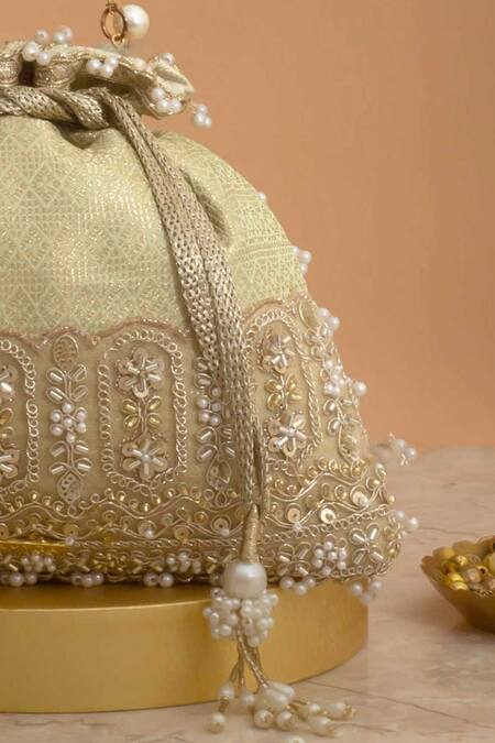 Shop Amyra Mint Cut Work, Pearls, Tassels, Beads Geet Brocade Embellished Potli - Online at Aza Fashions Shop_Amyra_Mint Cut Work, Pearls, Tassels, Beads Geet Brocade Embellished Potli -_Online_at_Aza_Fashions