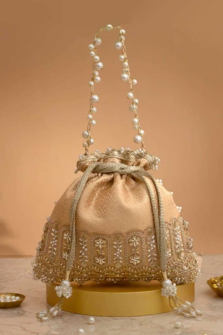 Amyra Peach Cut Work, Pearls, Tassels, Lace Geet Brocade Embellished Potli - 