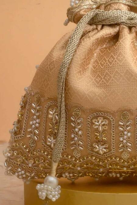 Buy Amyra Peach Cut Work, Pearls, Tassels, Lace Geet Brocade Embellished Potli - Online at Aza Fashions Buy_Amyra_Peach Cut Work, Pearls, Tassels, Lace Geet Brocade Embellished Potli -_Online_at_Aza_Fashions