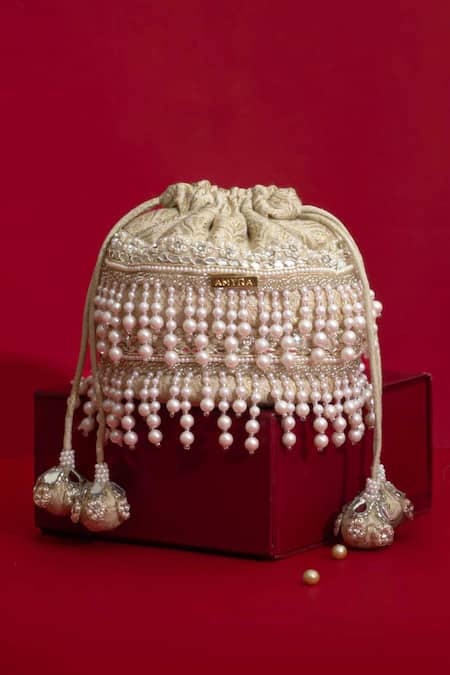 Amyra Ivory Pearls, Cut Work, Sequins, Embroidery, Tassels Anahi Brocade Mini Potli - at Aza Fashions Amyra_Ivory Pearls, Cut Work, Sequins, Embroidery, Tassels Anahi Brocade Mini Potli - _at_Aza_Fashions