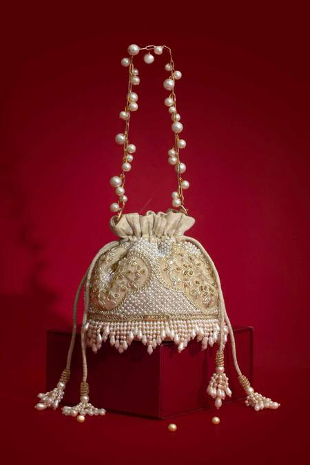 Amyra_Beige Pearls, Embroidery, Tassels, Beads Sehra Mini Potli - _at_Aza_Fashions