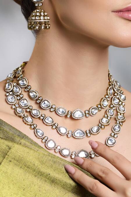 Shop Joules By Radhika Gold Plated Stones Kanaka Layered Embellished Necklace Set at Aza Fashions Shop_Joules By Radhika_Gold Plated Stones Kanaka Layered Embellished Necklace Set_at_Aza_Fashions