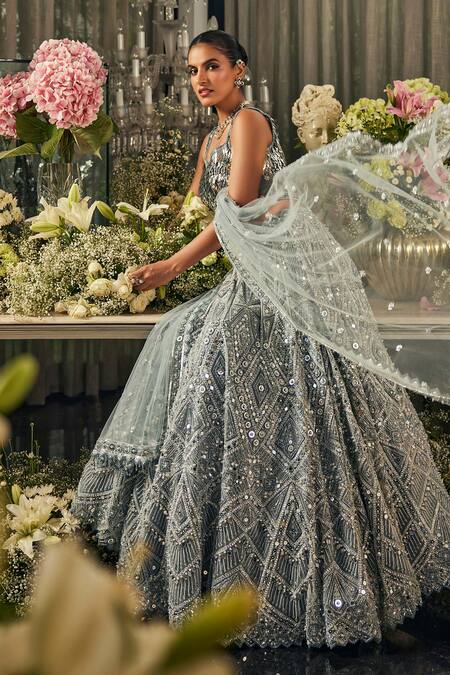 Isa By Dolly Wahal_Blue Net Mirrors, Sequins, Embroidery Square Neck Cerulean Lehenga Set _at_Aza_Fashions