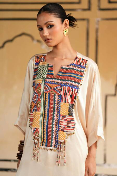 Shop_Rainas_Cream Satin Embroidery, Mirrors, Tassels Marusthal Muse Top And Dhoti Pant Set _Online_at_Aza_Fashions