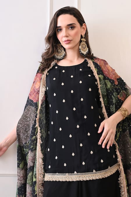 Peenacolada Black Crepe Embroidery, Sequins, Lace Round Floral Pattern Cape And Skirt Set at Aza Fashions Peenacolada_Black Crepe Embroidery, Sequins, Lace Round Floral Pattern Cape And Skirt Set _at_Aza_Fashions