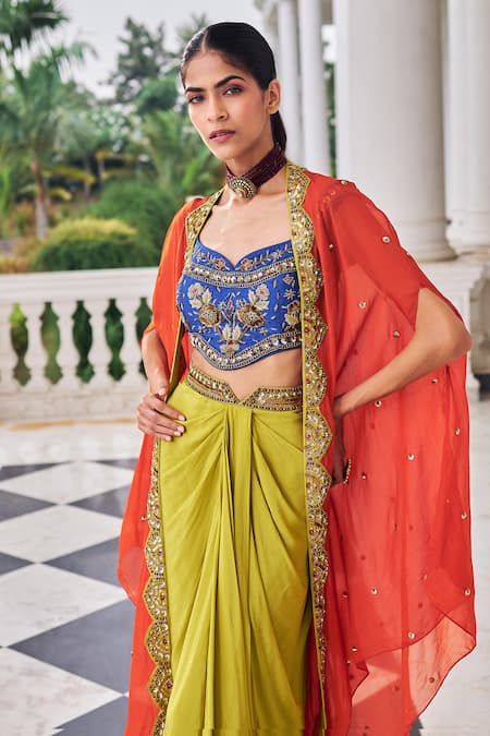 Nidhika Shekhar_Orange Crepe, Silk Embroidery, Sequins, Stones Round Ullusat Cape And Skirt Set _at_Aza_Fashions
