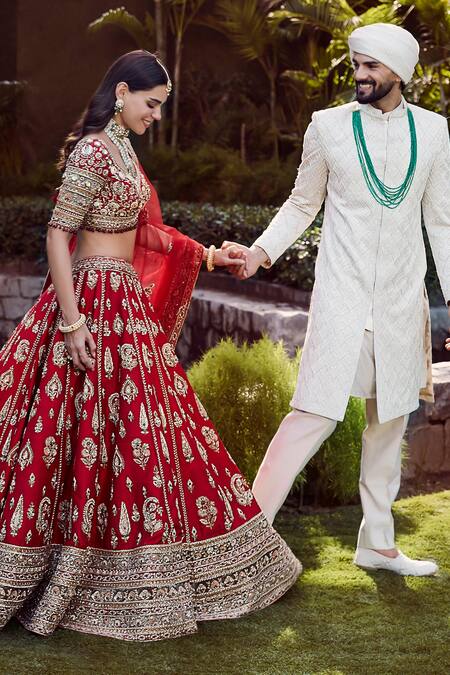 Shop Roqa Red Silk, Net Embroidery, Zari, Sequins, Stones Naima Bridal Lehenga Set Online at Aza Fashions Shop_Roqa_Red Silk, Net Embroidery, Zari, Sequins, Stones Naima Bridal Lehenga Set _Online_at_Aza_Fashions