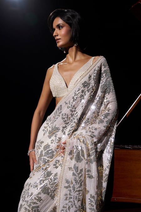 Seema Gujral_Ivory Georgette Sequins, Stones, Beads Gold Silver Work Saree With Blouse _at_Aza_Fashions