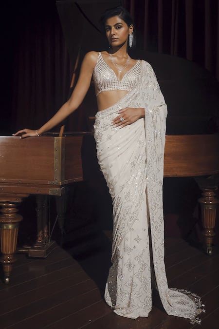 Shop_Seema Gujral_Beige Georgette Crystals, Embroidery, Zari V-neck Saree With Blouse _Online_at_Aza_Fashions