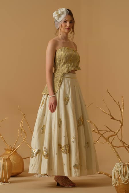 Shop_Abstract By Megha Jain Madaan_Gold Georgette, Tissue Sequins Bandeau Neck Embellished Ruched Top With Skirt _Online_at_Aza_Fashions