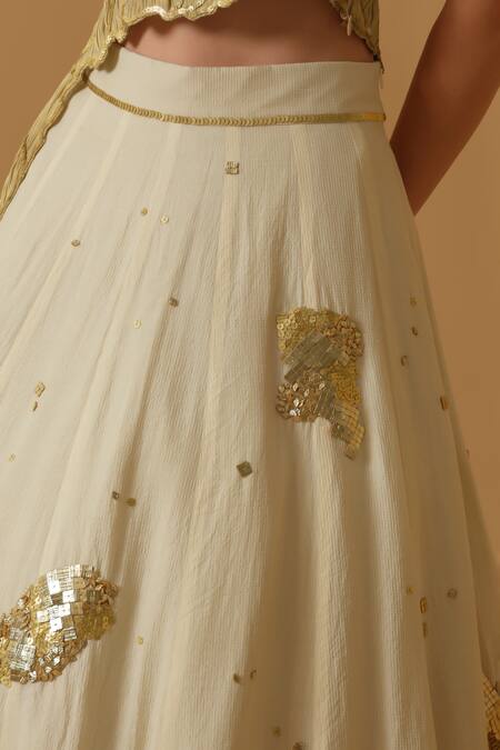 Shop_Abstract By Megha Jain Madaan_Gold Georgette, Tissue Sequins Bandeau Neck Embellished Ruched Top With Skirt 