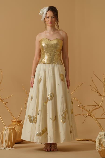 Abstract By Megha Jain Madaan_Gold Cotton Sequins Sweetheart Neck Embellished Corset With Skirt _at_Aza_Fashions