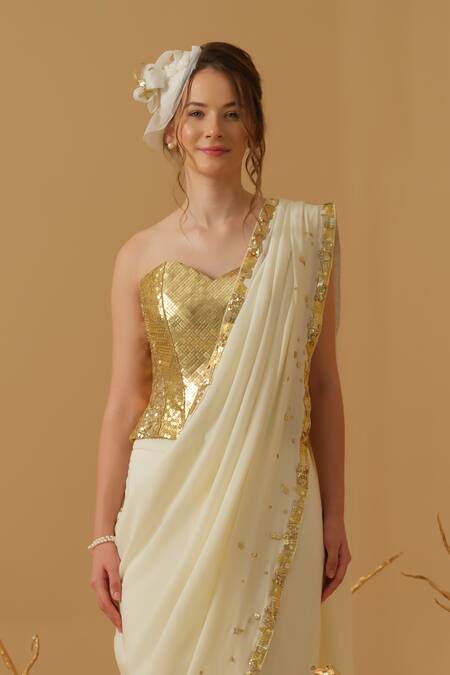 Abstract By Megha Jain Madaan_Gold Silk, Crepe, Jersey, Cotton Pre-draped Saree With Embellished Corset _Online_at_Aza_Fashions