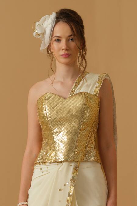 Abstract By Megha Jain Madaan_Gold Silk, Crepe, Jersey, Cotton Pre-draped Saree With Embellished Corset _Online_at_Aza_Fashions