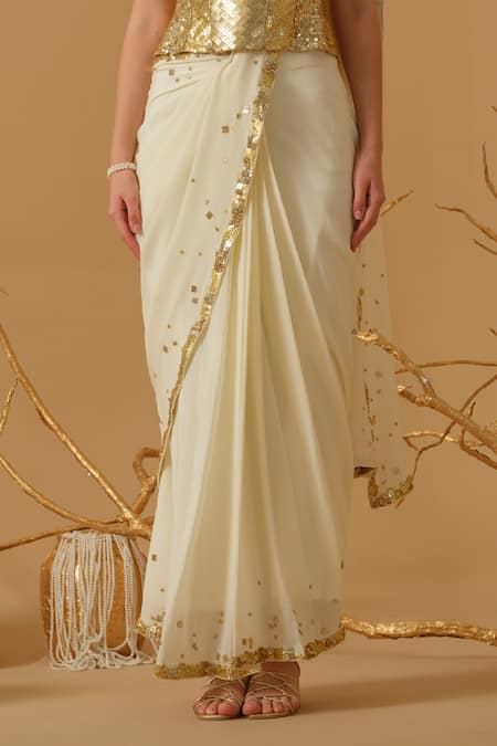 Buy_Abstract By Megha Jain Madaan_Gold Silk, Crepe, Jersey, Cotton Pre-draped Saree With Embellished Corset _Online_at_Aza_Fashions