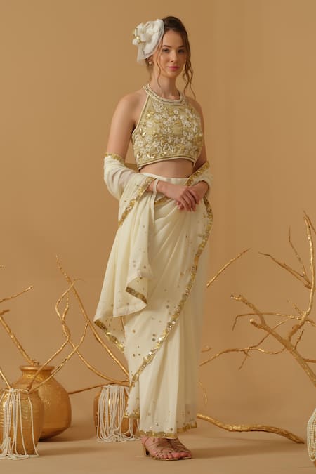 Shop_Abstract By Megha Jain Madaan_Ivory Georgette, Tissue, Silk, Crepe, Cotton Pre-draped Saree With Blouse _Online_at_Aza_Fashions