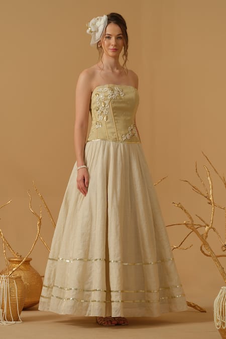 Abstract By Megha Jain Madaan_Gold Georgette, Tissue Embroidery, Sequins, Beads Bandeau Neck Corset Gown _at_Aza_Fashions