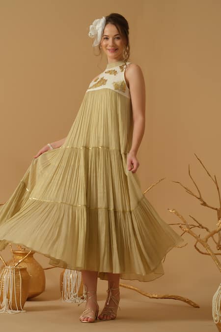 Abstract By Megha Jain Madaan Gold Georgette, Tissue Sequins Mandarin Collar Embellished Yoke Tiered Dress at Aza Fashions Abstract By Megha Jain Madaan_Gold Georgette, Tissue Sequins Mandarin Collar Embellished Yoke Tiered Dress _at_Aza_Fashions