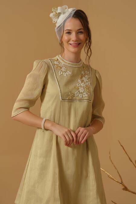 Abstract By Megha Jain Madaan_Gold Georgette, Tissue, Tulle Embroidery, Sequins, Beads, Ruffles Yoke Kurta Set _at_Aza_Fashions