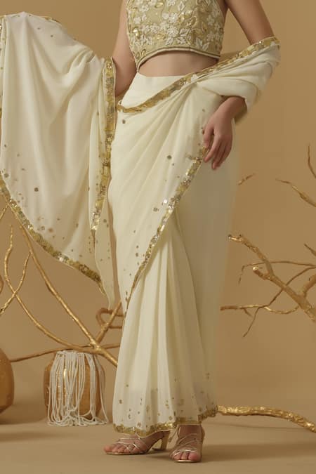Buy_Abstract By Megha Jain Madaan_Ivory Silk, Crepe, Jersey Sequins Embellished Border Pre-draped Saree _Online_at_Aza_Fashions