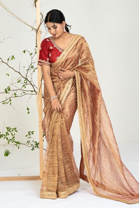 Ellemora Fashions_Gold Tissue Zari, Embroidery, Stones V-neck Intricate Pattern Saree With Blouse _at_Aza_Fashions