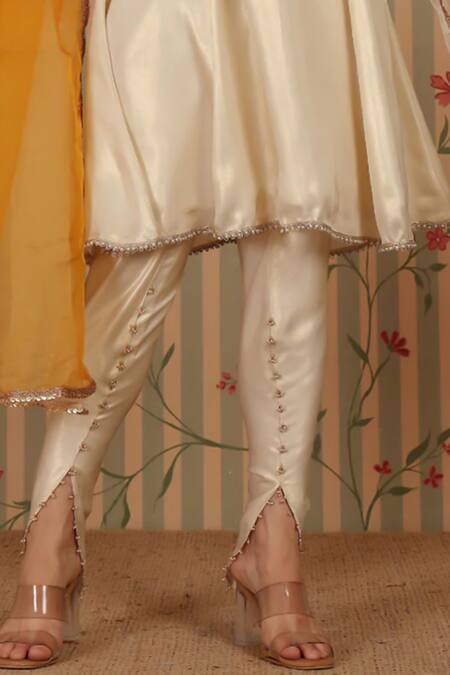 Nitisha Kashyap Official_Off White Georgette, Organza Embroidery, Sequins, A-line Kurta Tulip Pant Set _Online_at_Aza_Fashions