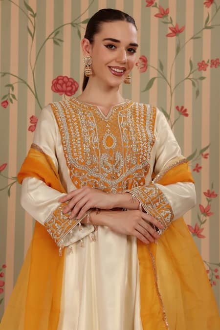 Buy_Nitisha Kashyap Official_Off White Georgette, Organza Embroidery, Sequins, A-line Kurta Tulip Pant Set _Online_at_Aza_Fashions